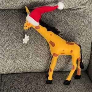 Annalee Christmas Giraffe holding Snowflake with Santa Hat